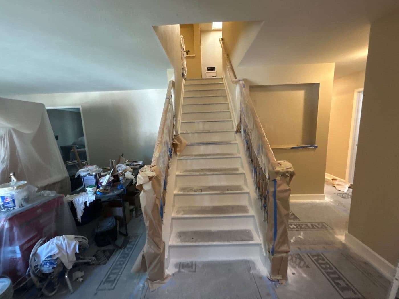 Stairwell masked and prepped before painting