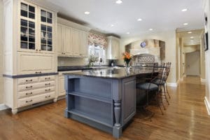 gray kitchen island with white cabinets